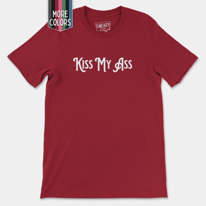 a red t - shirt with the words kiss my ass printed on it