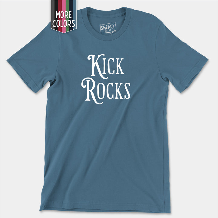 a blue t - shirt with the words kick rocks printed on it