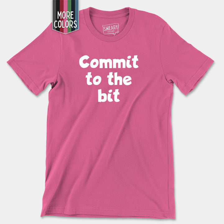 a pink shirt that says commit to the bit