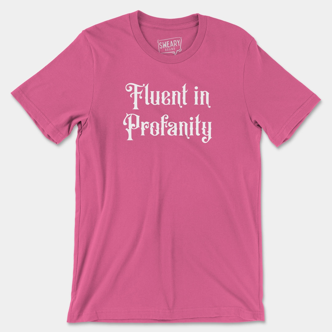 a pink t - shirt with the words fluent in profanity printed on