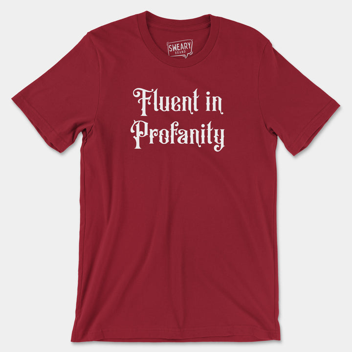 a red t - shirt that says fluent in profanity