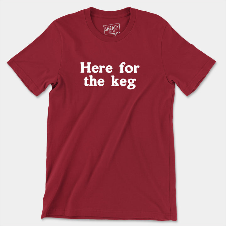 a red t - shirt that says here for the egg