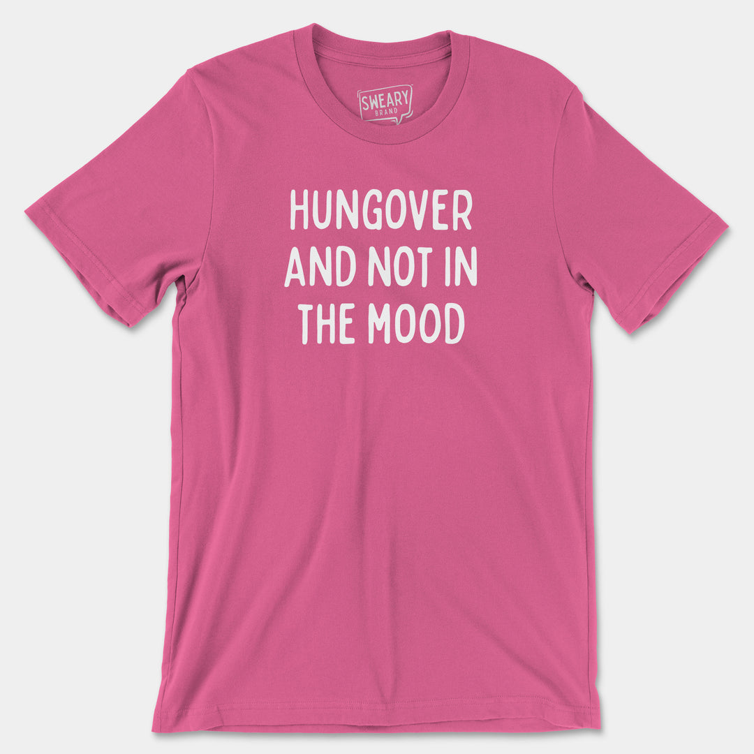 a pink t - shirt that says hungover and not in the mood