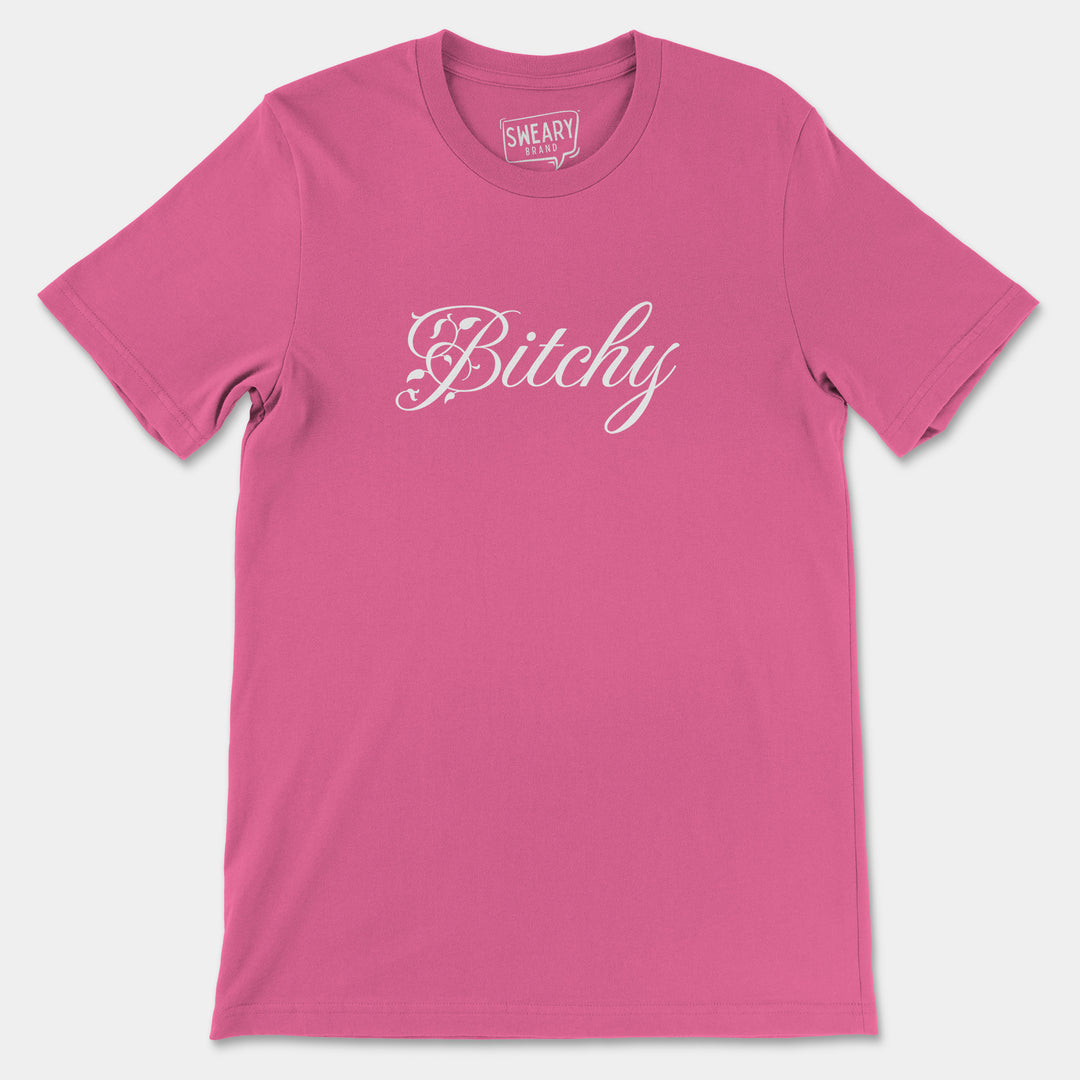 a pink t - shirt with the word bitchy printed on it